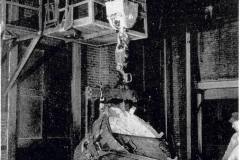 Pouring Metal Into Pig Molds [MA-3-1948]
