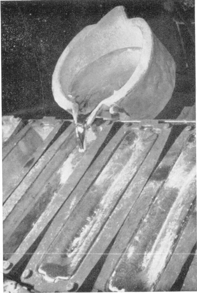 Molten Aluminum Poured from Ladle to Mold [MA-5-13-1946]